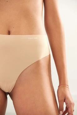 Brand new ???? Calvin Klein Invisibles High-Waisted Thong BEIGE ???? -Sweaty Betty Shop unnamed file 3534